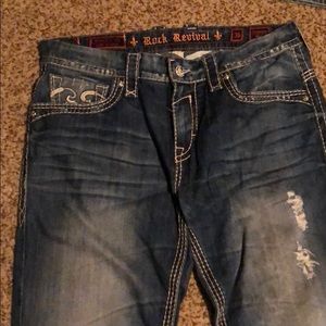 Slight distressed men’s rock revival jeans